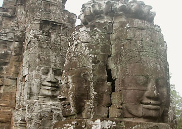 Giant stone faces in the Bayon temple at Angkor Thom